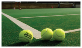 Tennis balls on court