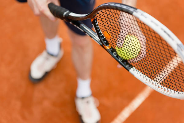 Tennis player on serve