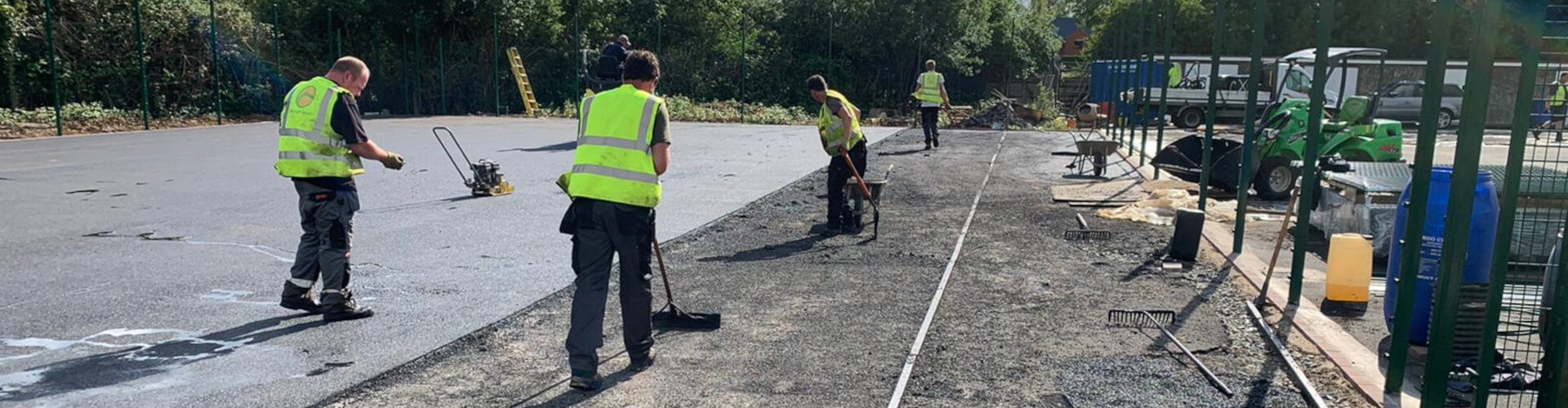 men working on new sports courts