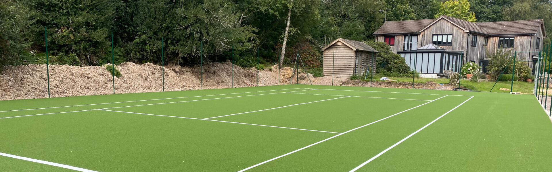 house next to tennis court