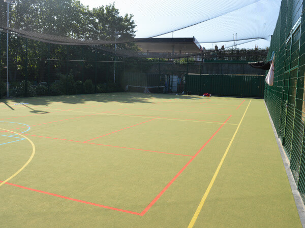 tennis court with nets over the top