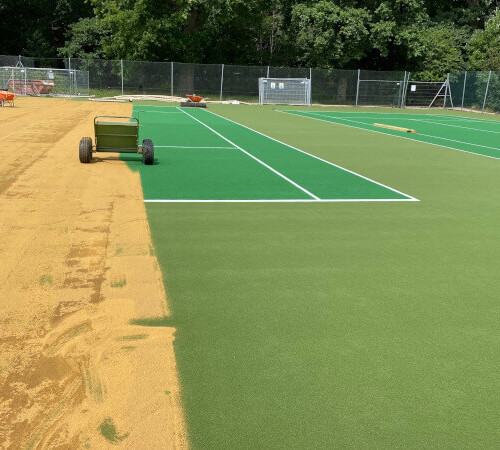 resurfacing a tennis court